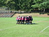 The rugby team in a huddle