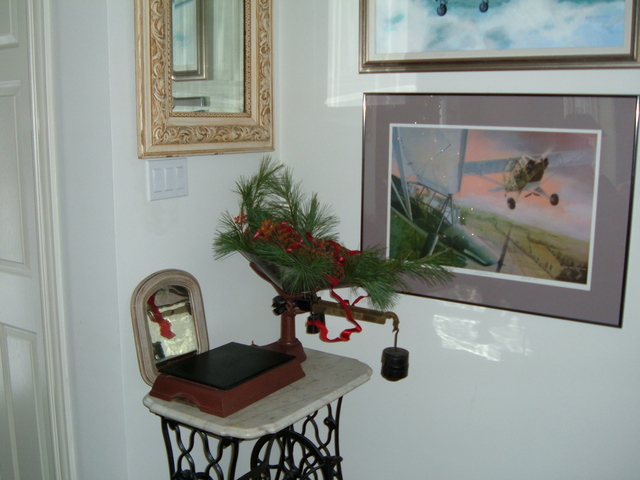 The Singer table with decorations and paintings